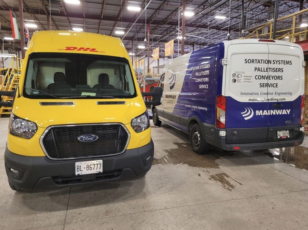 Mainway service van next to DHL delivery van