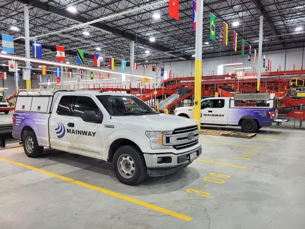 Mainway service trucks inside DHL hub